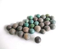 UpperDutch:Marbles,Green Antique marbles, Set of 30 antique clay marbles.