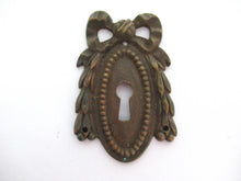 Antique Escutcheon, bow, keyhole cover, Restoration hardware.