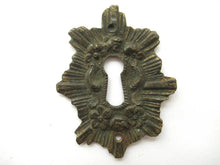 Antique ornate escutcheon, cover.