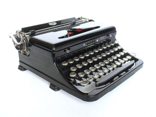 UpperDutch:Typewriter,Royal portable typewriter, made in 1937. Black