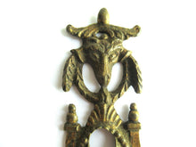 Antique escutcheon with Buck-Ram, keyhole frame, solid brass.