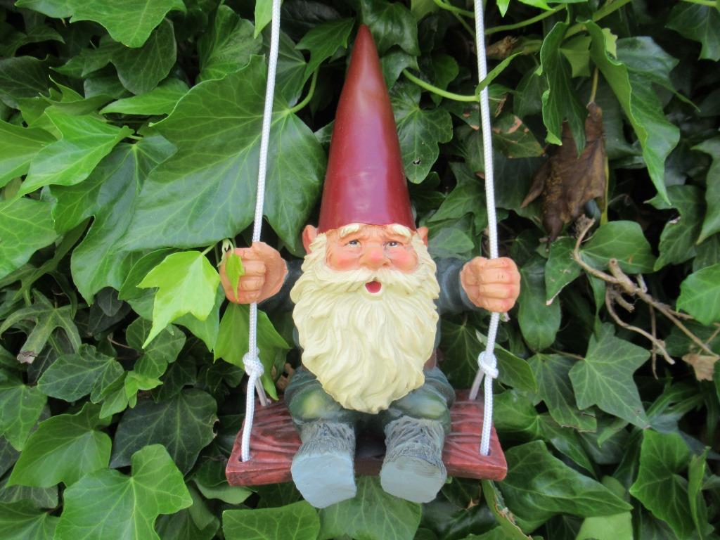 Garden gnome on Swing. Rien Poortvliet, David the Gnome.