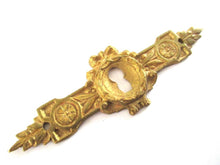 UpperDutch:Keyhole cover,Antique ornate brass keyhole cover, plate. Ornamental escutcheon, cabinet hardware, furniture applique, ormolu.