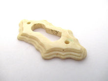UpperDutch:Keyhole cover,Bone Keyhole cover, plate, bone escutcheon, keyhole frame.