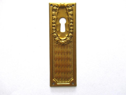 1 (ONE) Keyhole cover, Brass Stamped Floral Escutcheon, keyhole plate, with roses.