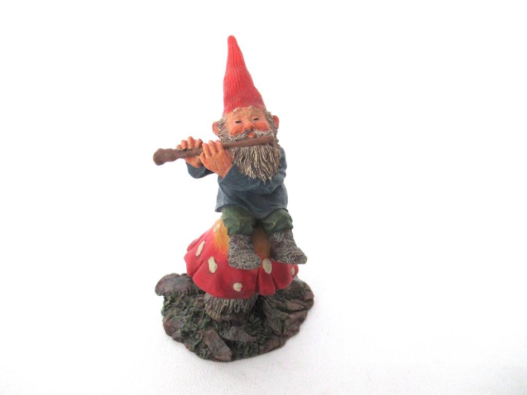 Gnome 'Mo on Mushroom' after a design by Rien Poortvliet, Gnome playing a flute.