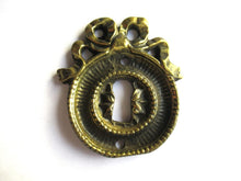 Antique Bow Escutcheon, Solid Brass, Keyhole Cover.