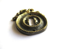 Antique Bow Escutcheon, Solid Brass, Keyhole Cover.