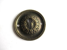 Vintage Thin Pressed Keyhole cover, floral design.