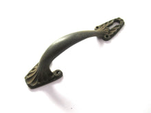 Drawer handle including keyhole cover, escutcheon.