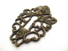 Antique Escutcheon, Keyhole cover, Cherub.