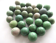 Set of 30 Antique Clay Green Marbles.