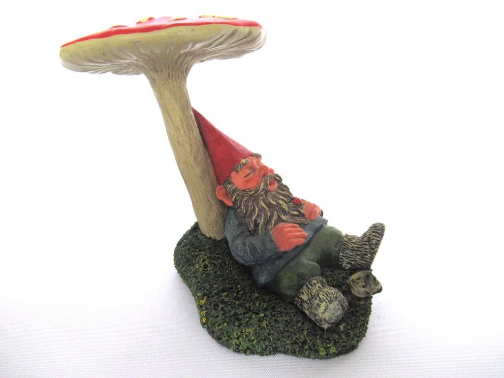 Gnome sleeping under a mushroom. 'Slumber Chief' a design by Rien Poortvliet.