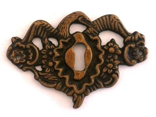 UpperDutch:Hooks and Hardware,1 Antique solid brass bird keyhole frame, Antique ornate floral key hole plate. Escutcheon with flowers and a large bird wings.