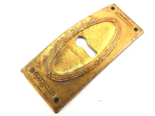 UpperDutch:Hooks and Hardware,Authentic Art Deco Keyhole cover, Stamped Escutcheon, key hole plate.