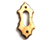 UpperDutch:Hooks and Hardware,Bone Keyhole cover, plate, bone escutcheon, keyhole frame.