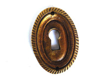 UpperDutch:Hooks and Hardware,1 (ONE) small Oval Keyhole cover, Antique brass escutcheon, key hole frame, plate.