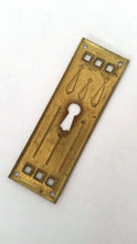 UpperDutch:Hooks and Hardware,Authentic Shabby antique Art Deco Keyhole cover, Stamped Escutcheon, keyhole plate.