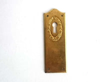 UpperDutch:Hooks and Hardware,1 Keyhole Escutcheon metal Keyhole cover, stamped keyhole frame, stamping plate.
