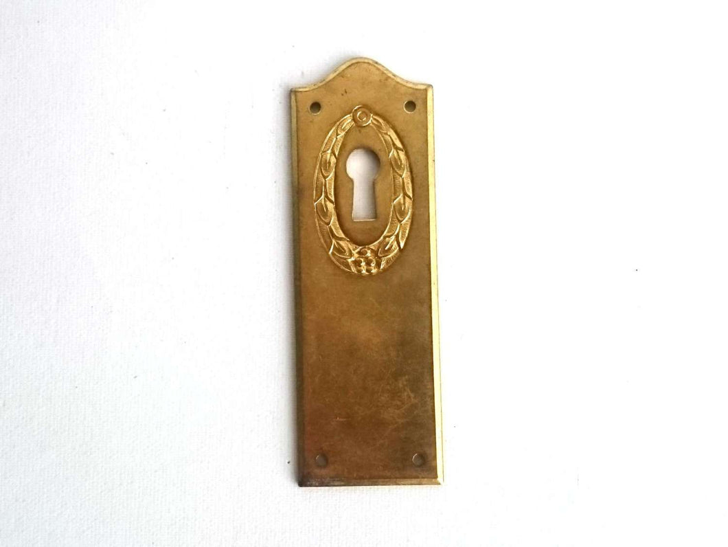 UpperDutch:Hooks and Hardware,1 Keyhole Escutcheon metal Keyhole cover, stamped keyhole frame, stamping plate.