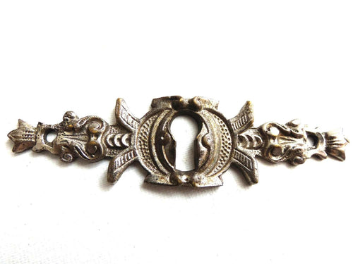 UpperDutch:Hooks and Hardware,Keyhole cover, Shabby antique silver tone metal key hole frame / plate. Ornamental escutcheon, cabinet hardware.
