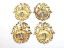 UpperDutch:,1 (ONE) French Keyhole cover, Empire Solid brass large Key Hole Frame. Oval leaf and bow shape. Restoration hardware.