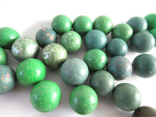 UpperDutch:Marbles,Green Marbles, Set of 30 green Antique Clay Marbles.