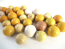 UpperDutch:Marbles,Set of 30 Antique Clay Marbles, Antique marbles.