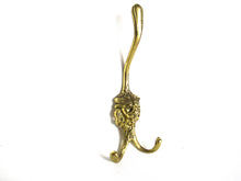 Vintage brass lion head wall hook, coat hook.