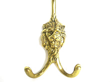 Vintage brass lion head wall hook, coat hook.