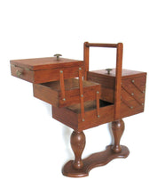 Antique wooden sewing box on legs. Storage box for sewing supplies or jewelry. Cantilever sewing box.