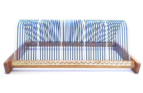 Vintage vinyl record storage rack, vinyl record holder. Music storage, singles rack.