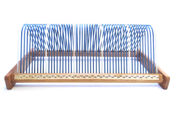 Vintage vinyl record storage rack, vinyl record holder. Music storage, singles rack.