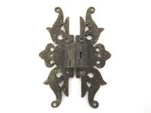 Authentic antique brass hinges.