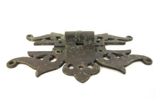 Authentic antique brass hinges.