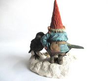 Gnome statue 'Thomas & Birds'. David the gnome feeding birds in the snow. Designed by Rien Poortvliet.
