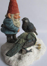 Gnome statue 'Thomas & Birds'. David the gnome feeding birds in the snow. Designed by Rien Poortvliet.