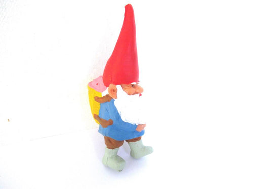 David the gnome with a basket full of strawberries on his back, after a design by Rien Poortvliet, David the Gnome. BRB