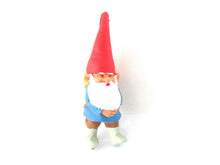 David the gnome with a basket full of strawberries on his back, after a design by Rien Poortvliet, David the Gnome. BRB