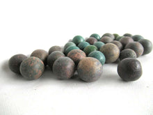 UpperDutch:Marbles,Green Antique marbles, Set of 30 antique clay marbles.