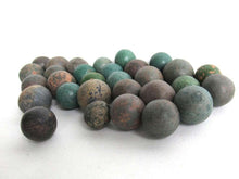 UpperDutch:Marbles,Green Antique marbles, Set of 30 antique clay marbles.