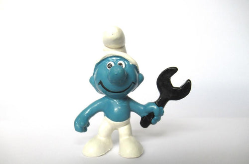 Mechanic Smurf holding a black wrench, Schleich, Peyo, Pvc figurine.