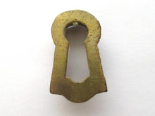 1 (ONE) Tiny antique brass keyhole insert, key hole cover. Furniture decoration. Distressed hardware. Restoration supply for chest / box.