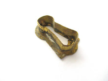 1 (ONE) Tiny antique brass keyhole insert, key hole cover. Furniture decoration. Distressed hardware. Restoration supply for chest / box.