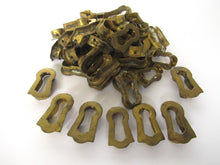 1 (ONE) Tiny antique brass keyhole insert, key hole cover. Furniture decoration. Distressed hardware. Restoration supply for chest / box.