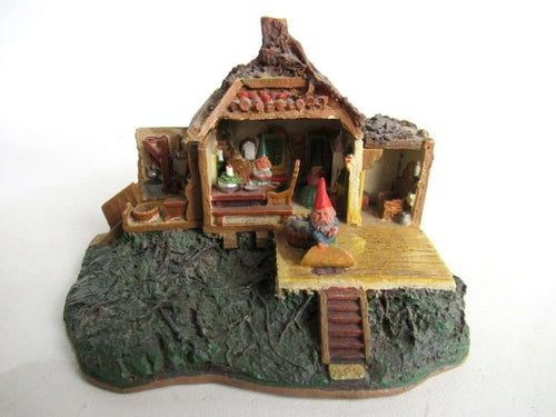 UpperDutch:Gnomes,Gnome figurine after a design by Rien Poortvliet Classic Gnomes Villages 'Open house'.