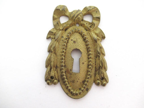 Antique Escutcheon, bow, keyhole cover, Restoration hardware.