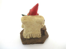 Gnome figurine with grandchildren sitting in a chair. 'Grandfather with Children' Classic Gnomes designed by Rien Poortvliet