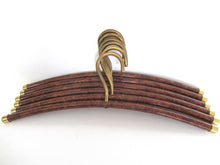 Set of 6 Vintage clothes hangers.