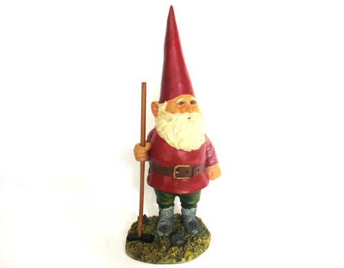 Gnome statue with broom after a design by Rien Poortvliet, David the Gnome.